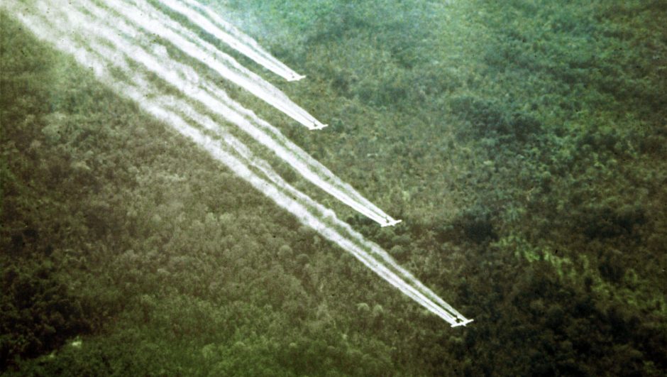 Four-ship formation on a defoliation spray run. (U.S. Air Force photo)